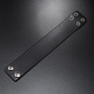 Retro black leather wristband with adjustable silver snap buttons and stitched edges