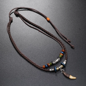 Mens vintage tribal necklace with brown leather cords and animal tooth shaped pendant
