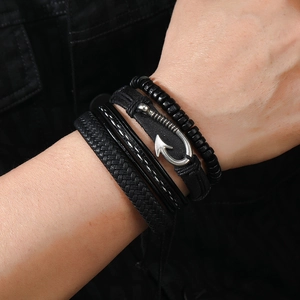 Men's multi-layer black leather bracelet set with wooden beads and silver hook clasp