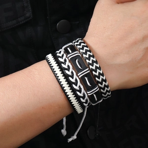 Men's punk 4-piece multilayer leather bracelet set with woven black and white cords