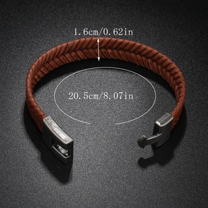 Retro braided leather bracelet for men with silver magnetic buckle on black background