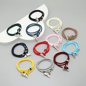 Nautical whale tail woven bracelets in various colors with silver buckle clasps