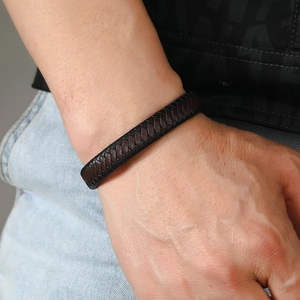 Men's multilayered braided leather bracelet in black and brown featuring vintage design