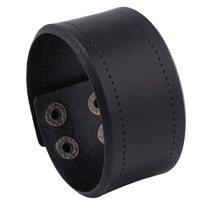 Vintage wide black leather punk bracelet with textured finish and metal snap closure