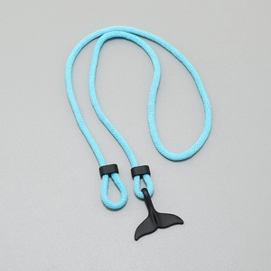 Detailed view of light blue braided cord with black matte whale tail charm and sliders
