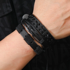 Men's multi-layer black braided leather bracelet set with woven details and punk style