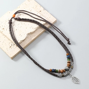 Bohemian multilayer sweater necklace with vintage wood beads and silver leaf pendant