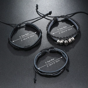 Set of 3 layered leather bracelets with skull charm and adjustable pull knots for men