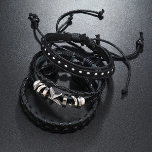 Handmade 3-piece set of black layered leather bracelets with stars and punk metal charms