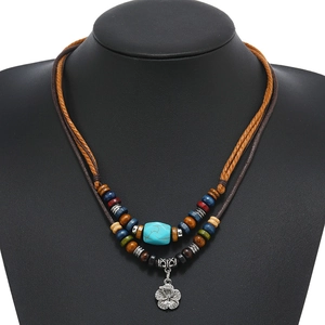 Bohemian multilayer necklace with colorful beads and hibiscus flower pendant
