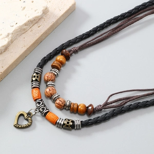 Vintage multilayer woven necklace with bronze heart pendant and bohemian beads