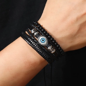 Three-piece men's multi-layer bracelet featuring woven leather and Nazar evil eye charm