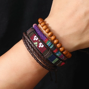 Bohemian style 4-piece set of leather and beaded bracelets in retro woven design