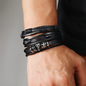 Mens multilayer leather bracelet set with silver skull and braided cord wrap style