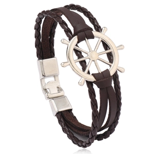 Vintage nautical braided leather bracelet with silver metal rudder and buckle