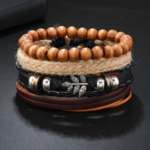 Handmade multilayer leather bracelet set with wooden beads and leaf pendant charm