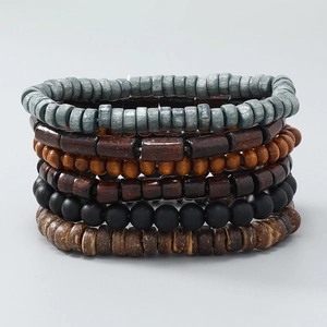 Detail of 6-piece bohemian stackable bracelets with vintage wood and coconut shell beads