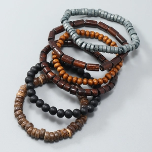 Set of 6 ethnic style beaded wooden bracelets in mixed colors and geometric shapes