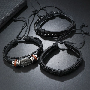 Ensemble de bracelets vintage en cuir noir tressé multicouches avec breloques en métal