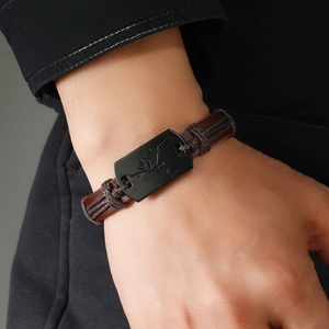 Handmade woven leather bracelet for men with vintage engraved bird pattern metal plate