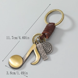 Vintage leather musical note keychain with engraved bronze metal charms for bags