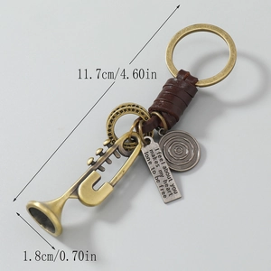 Porte-clés en cuir fait main avec pendentif trompette en bronze et plaque métal gravée