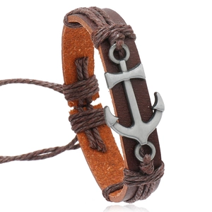 Handmade nautical anchor bracelet with dark brown braided leather and vintage silver charm