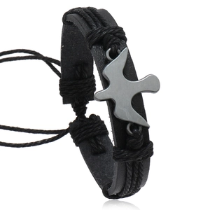 Handmade woven black leather bracelet featuring a vintage silver bird charm for men