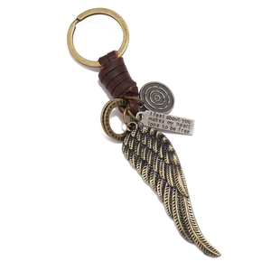 Handmade leather keychain with bronze feather wing pendant and engraved metal plate