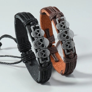 Set de pulseras de cuero punk vintage con calaveras de plata en negro y marrón