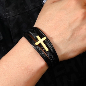 Men's multilayer black braided leather bracelet with a polished gold cross magnetic clasp