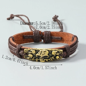 Vintage punk woven leather bracelet with golden skull plate and adjustable cord