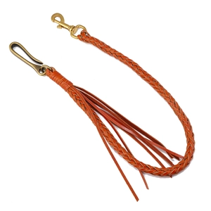 Catena per pantaloni in pelle intrecciata arancione marrone con ganci in ottone e nappe