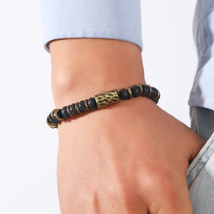 Men's retro black lava rock beaded bracelet with handcrafted textured gold metal accents