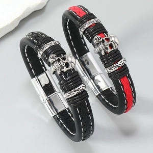 Men's punk braided leather bracelets set with silver skull charm and magnetic clasp