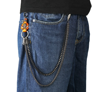 Punk style double-layered metal trouser chain with orange leather skull pendant