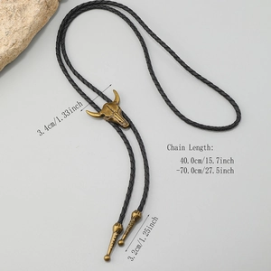 Vintage western bull skull bolo tie with adjustable black braided leather cord and metal tips