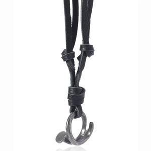 Adjustable vintage leather necklace with industrial nail-shaped pendant on white background
