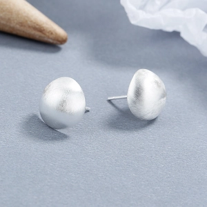 Minimalist 925 sterling silver half-sphere stud earrings with a matte brushed finish