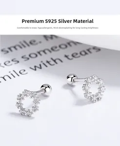 Macro shot of 925 sterling silver screw back stud earrings with round zircon pavé