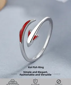 Detail of S925 sterling silver koi fish ring featuring red enamel and hypoallergenic plating