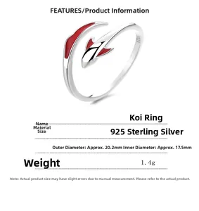 Macro detail of 925 sterling silver koi fish ring with red enamel and S925 hallmark stamp