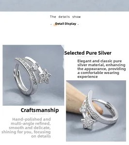 Detail shot of 925 sterling silver star hoop earrings with micro-pave cubic zirconia