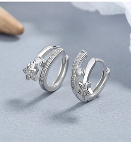 Macro view of 925 silver star hoop earrings featuring micro-set zircon and sleek polish