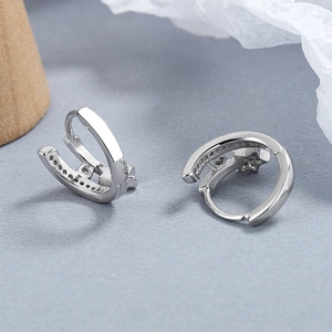 925 sterling silver star hoop earrings featuring micro-pave cubic zirconia and sleek band