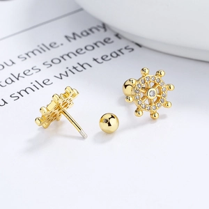 925 silver golden ship wheel stud earrings with white zircons and screw back closure