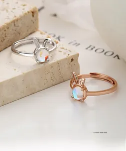 Detail of 925 sterling silver rabbit moonstone rings with micro-engraving details