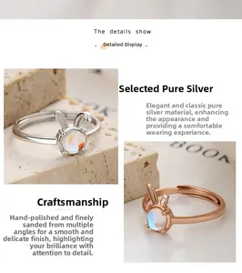 Detail of silver and rose gold rabbit moonstone rings with adjustable open band design