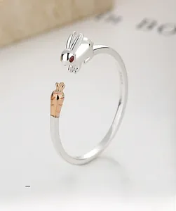 Detailed close-up of S925 silver rabbit and carrot open ring with zircon stones