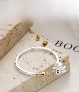 Macro detail of S925 sterling silver ring showing bunny carrot design and S925 hallmark
